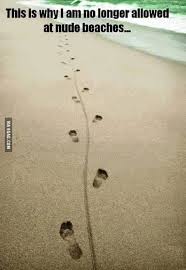 Footprints in the sand with a line trailing between them. The meme text reads: this is why I'm no longer allowed at nude beaches